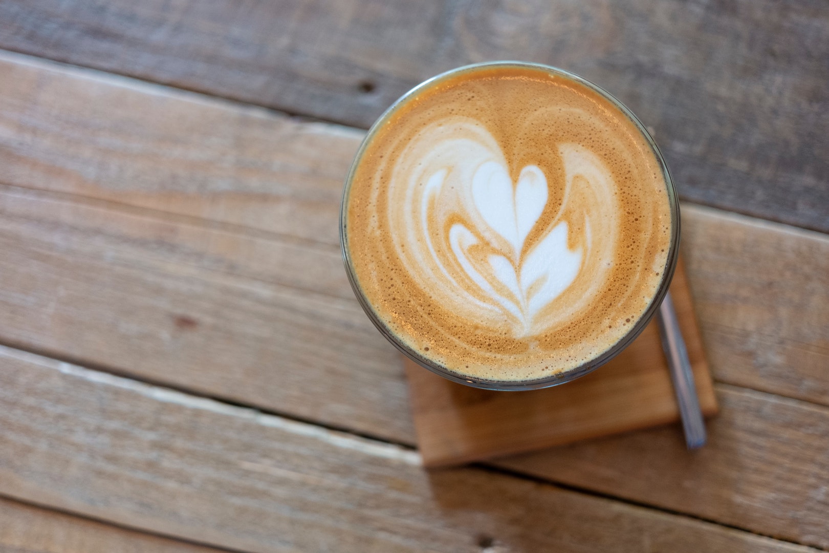 Image of a cinnamon oat milk latte, infused with a LĒVO II device.