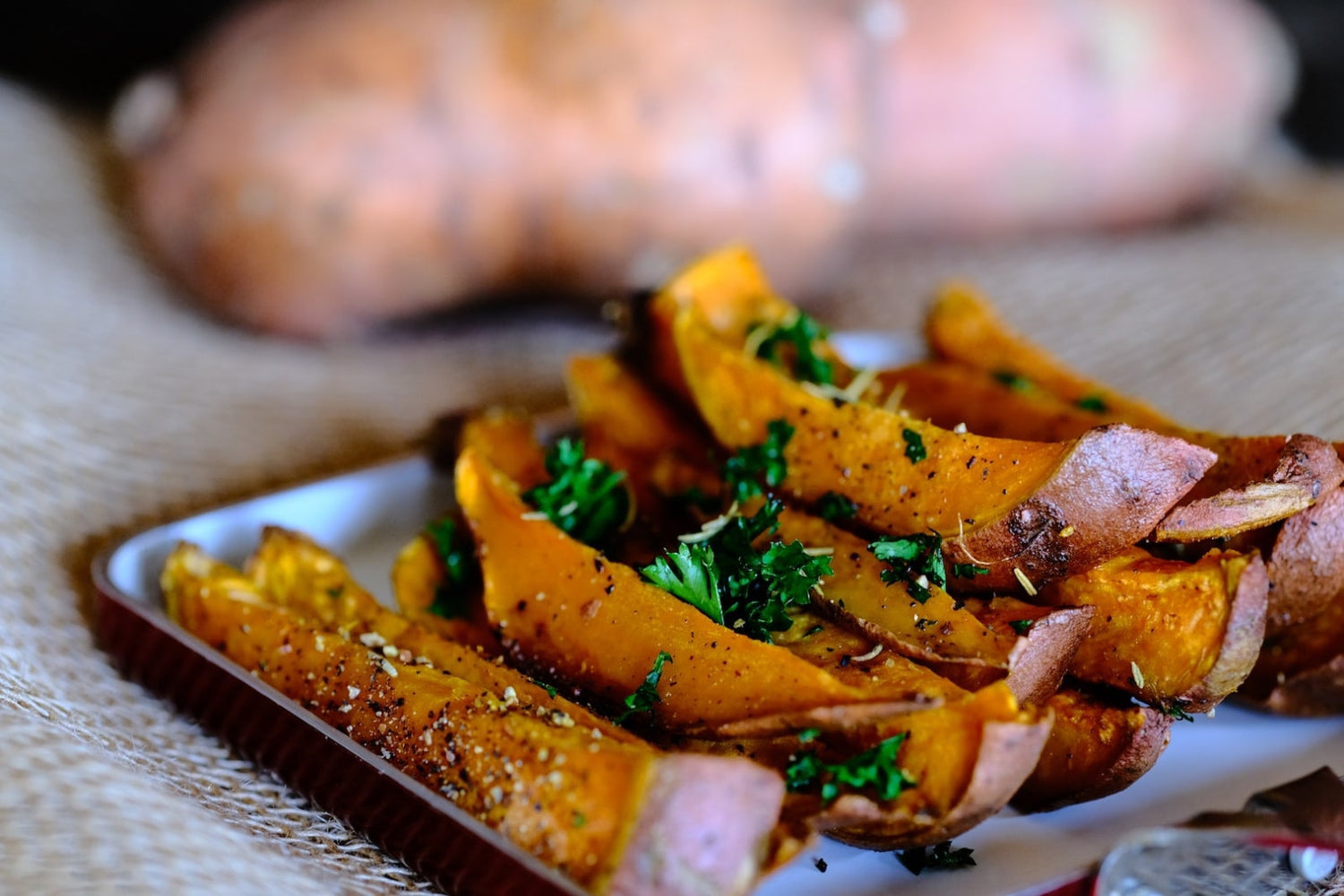 Image of sweet potato fries. Make your own by following LĒVO's cajun sweet potato fries recipe.