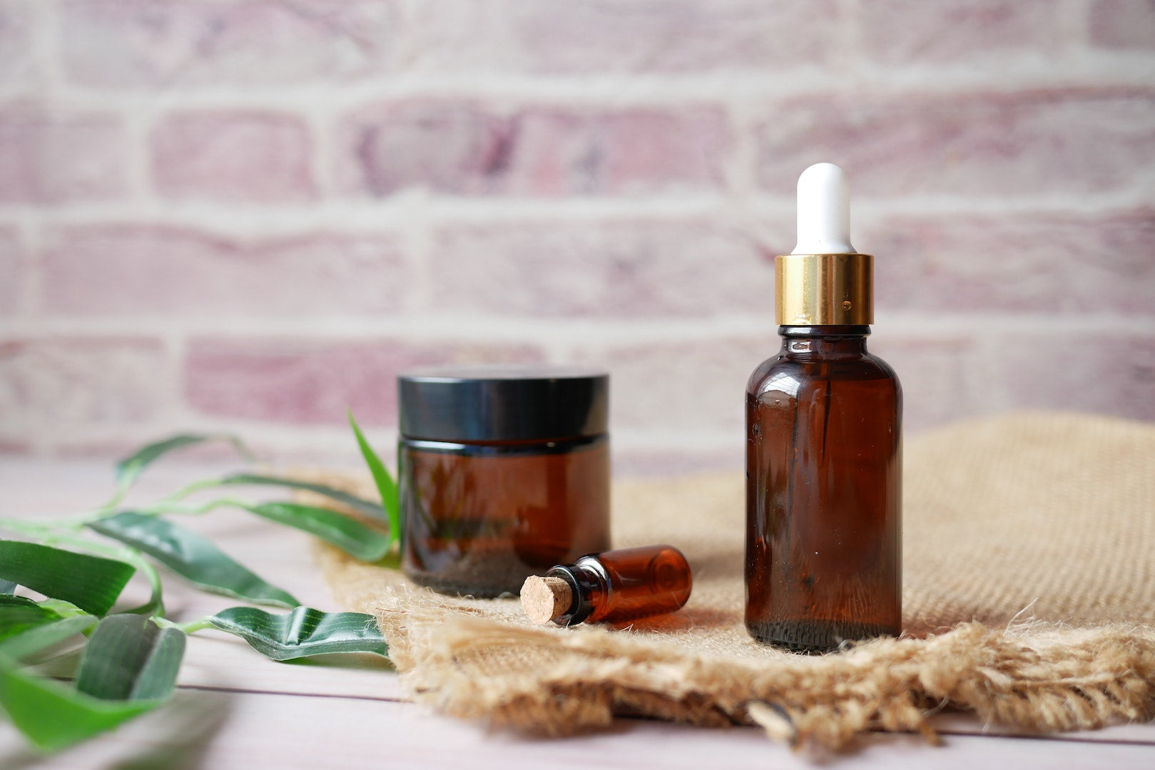 Image of two bottles containing LEVO's eucalyptus jojoba oil.