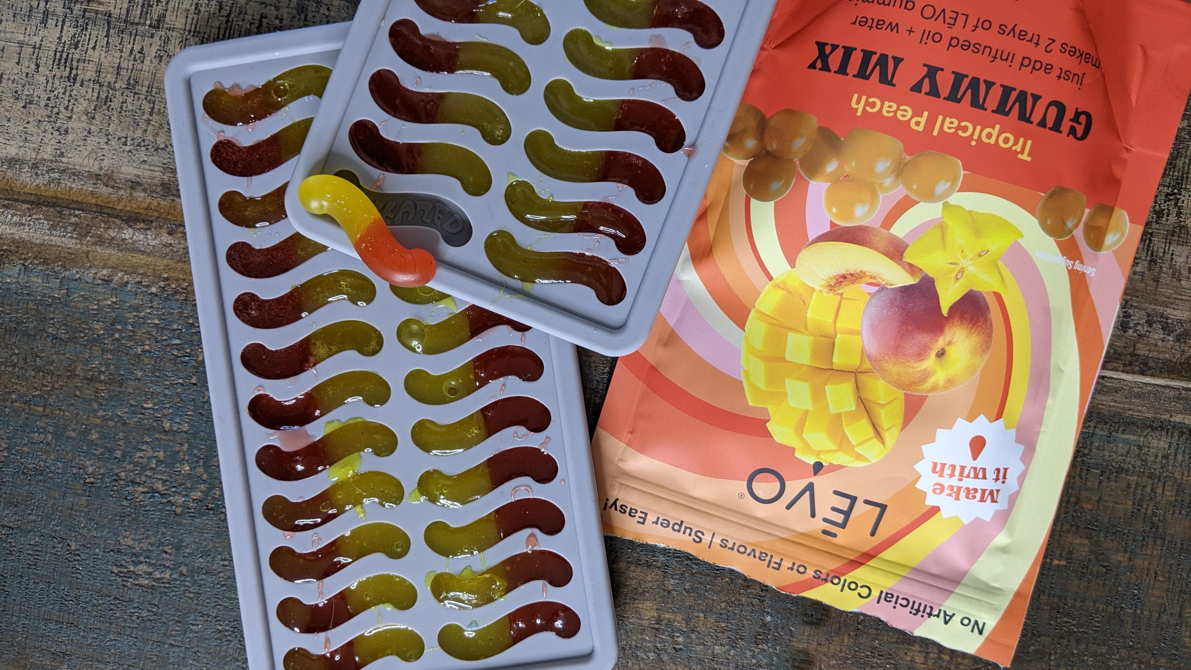 LEVO Gummy Worm Mold filled with LEVO Gummy Mix