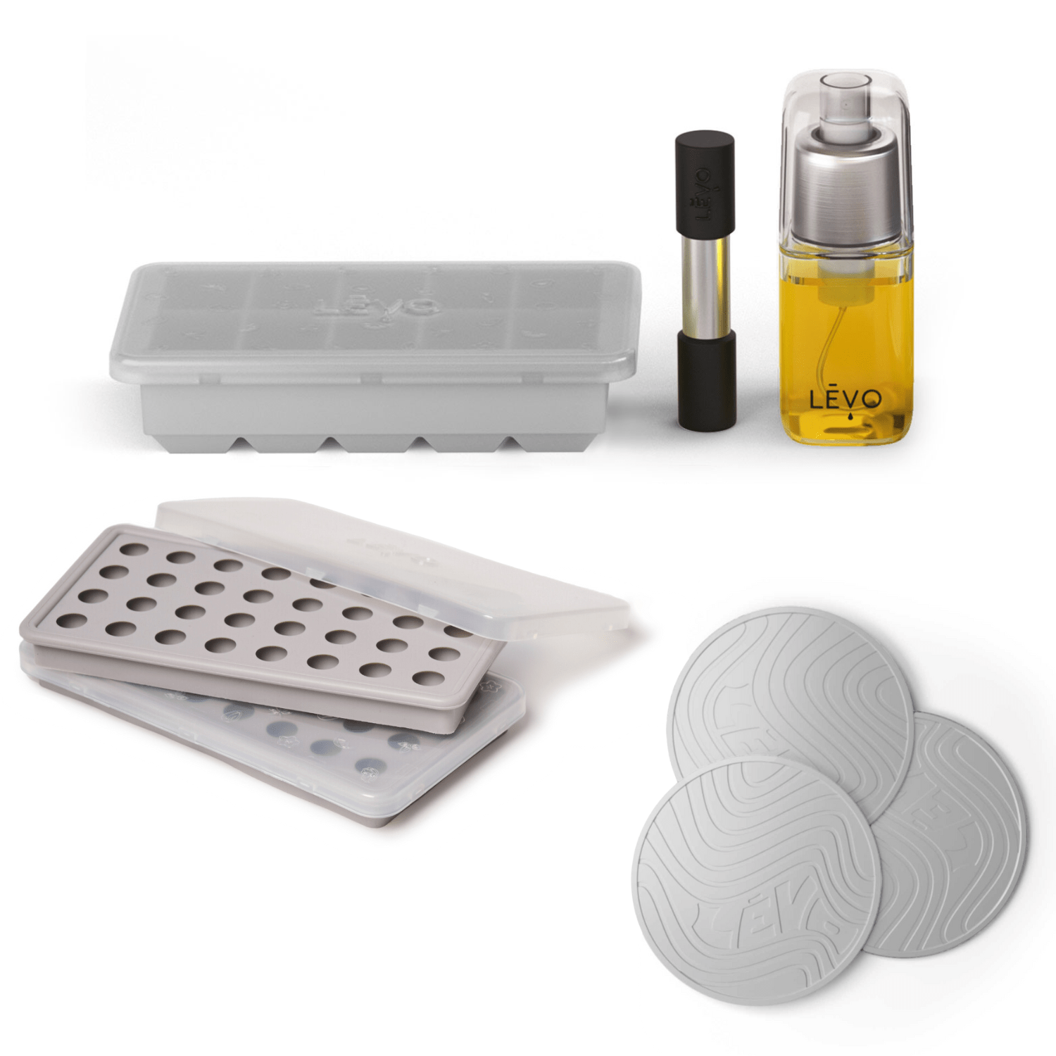 The LĒVO Basics Accessories Kit with gummy molds, silicone trivets, herb block tray, herb press, and infusion sprayer