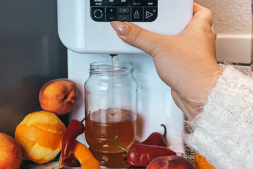 Homemade hot peach infused honey