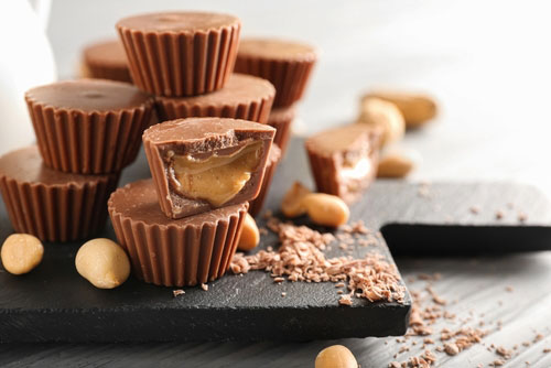 Make your own infused and elevated peanut butter cups with infused oil.