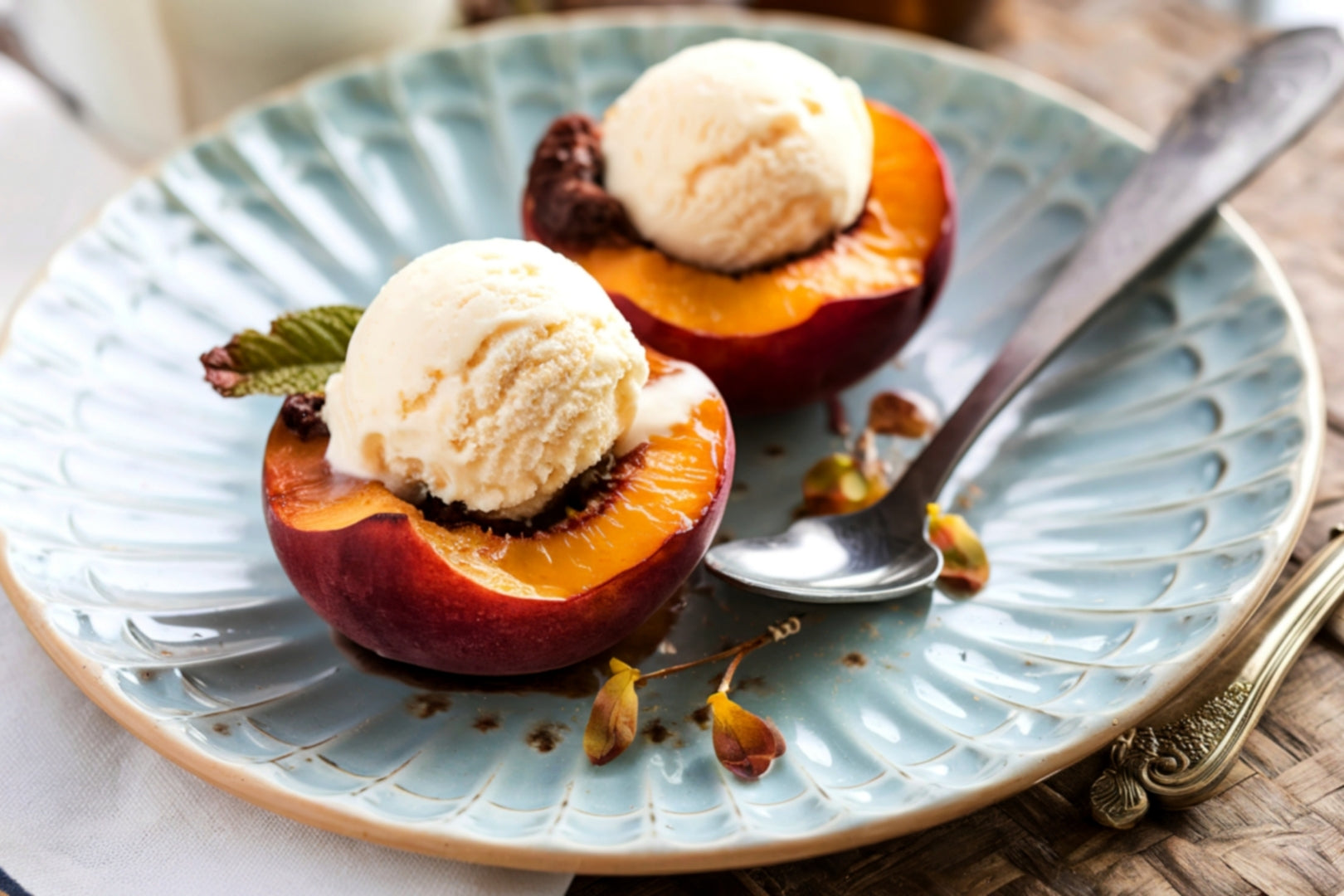 Image of baked nectarines with ice cream for the baked nectarines recipe by LEVO.