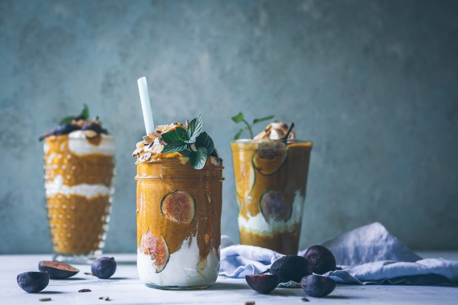 Image of two fig smoothies. Make your own by following LĒVO's fig smoothie recipe.