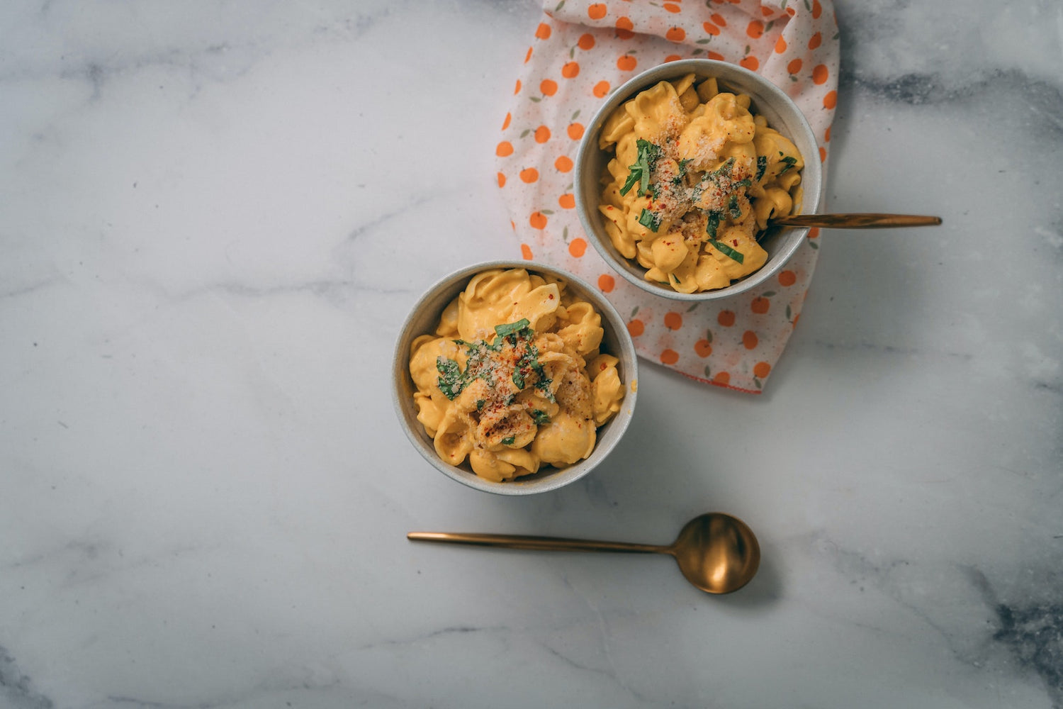 Image of two bowls of infused mac and cheese, made with LĒVO.