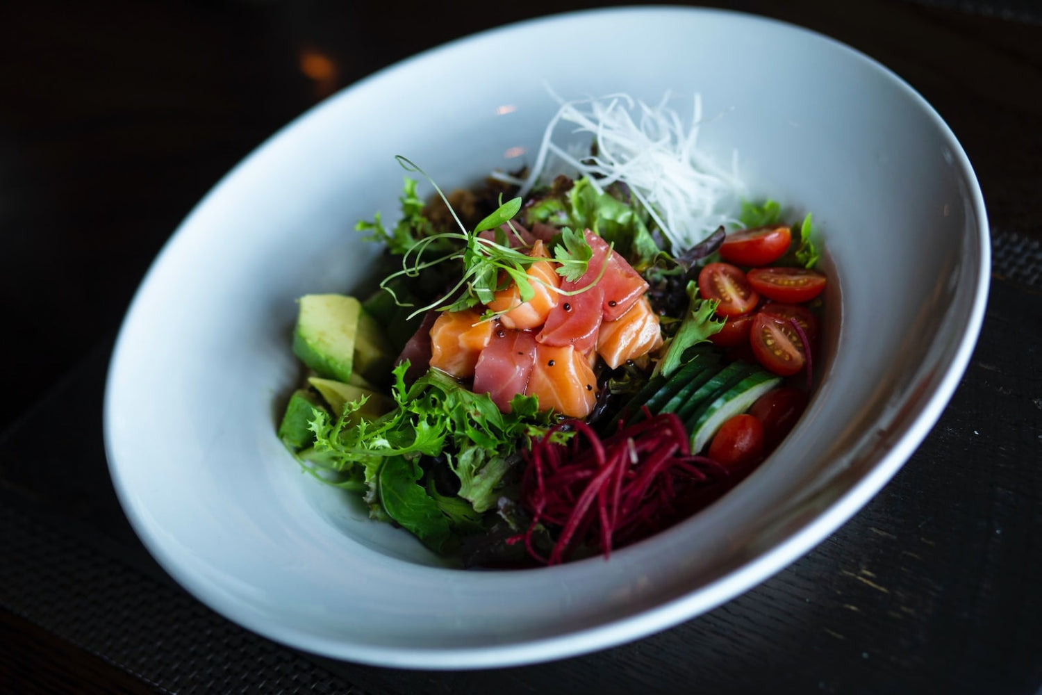 Image of a bowl of infused poke. Made by following LĒVO's infused poke recipe.