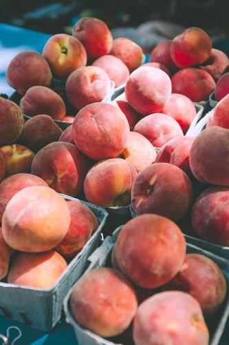 Image of a basket of peaches used for the recipe for peach BBQ sauce by LEVO.
