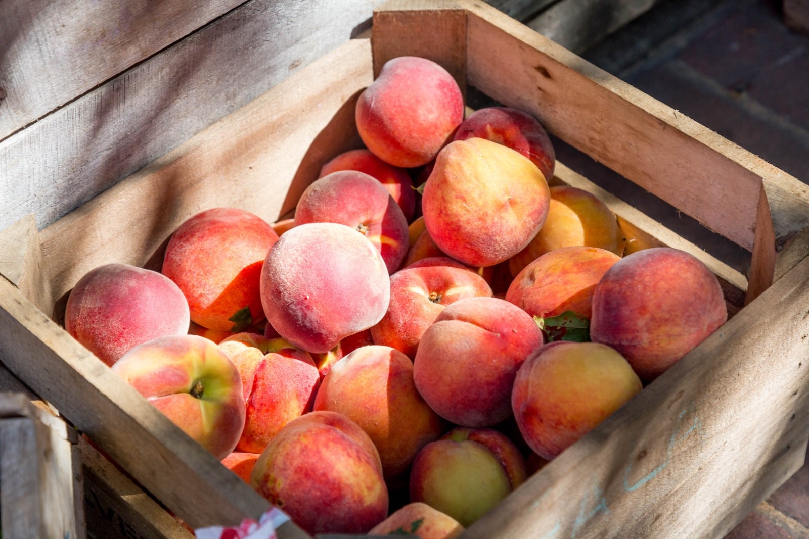 Peaches used in making LĒVO's infused strawberry peach crisp.