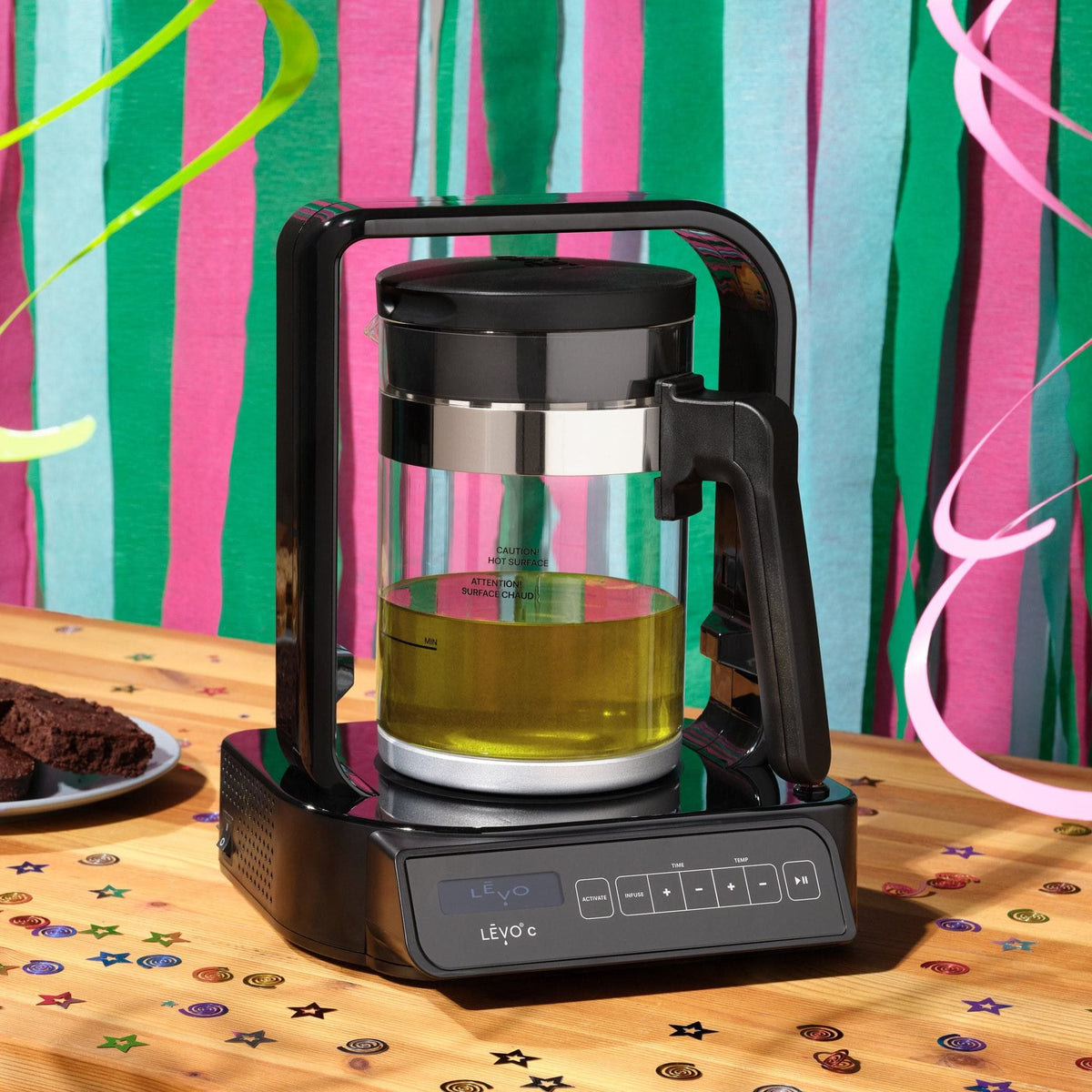 LĒVO C in Licorice Black with infused oil at a party #Color_Licorice Black