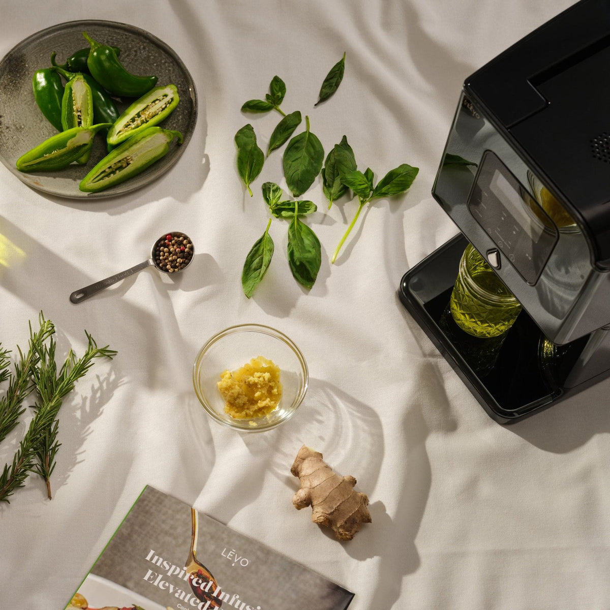LĒVO II+ in Licorice Black with fresh herbs, peppers and infused oil #Color_Licorice Black
