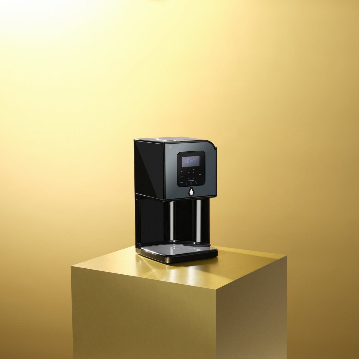 LĒVO Lux in Black Steel on a gold pedestal #Color_Black Steel