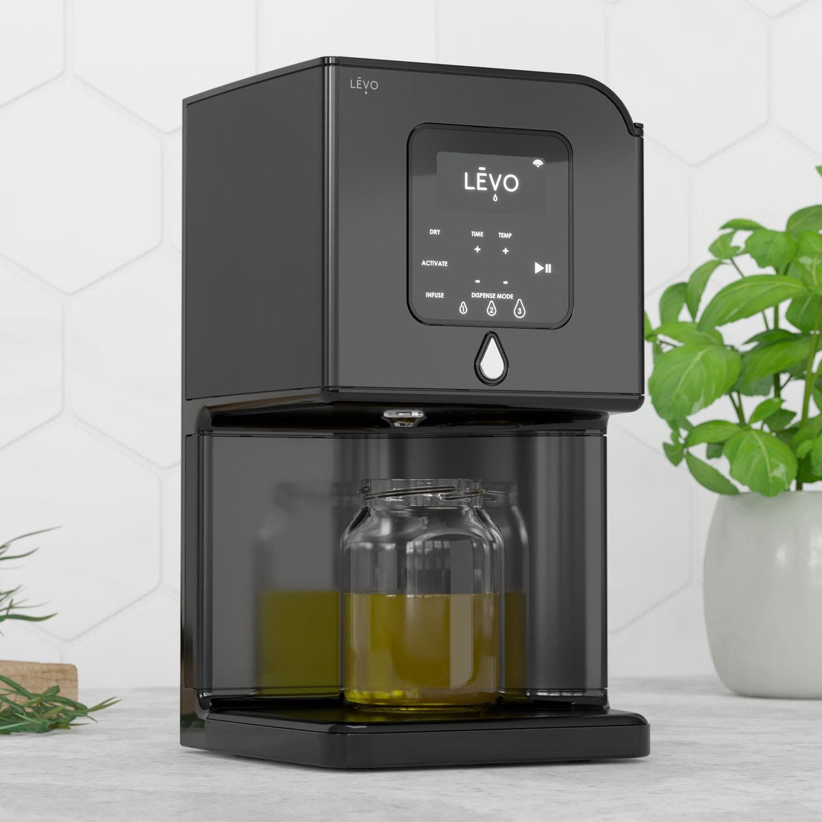 LĒVO Lux in Black Steel with a jar of infused oil #Color_Black Steel