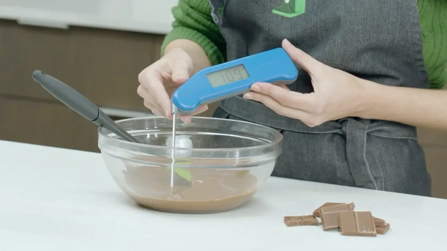 How to use a candy thermometer to make homemade chocolate edibles using LEVO oil.