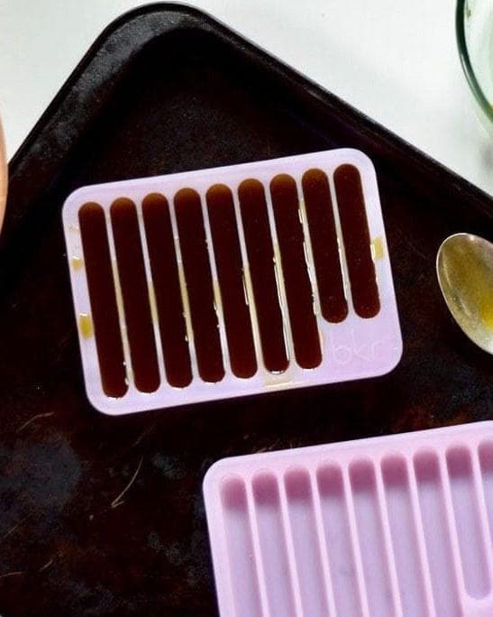Silicone gummy molds on a tray