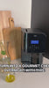 Home cook making a chili and herb infused oil in his LĒVO II+ and finishing ravioli with it